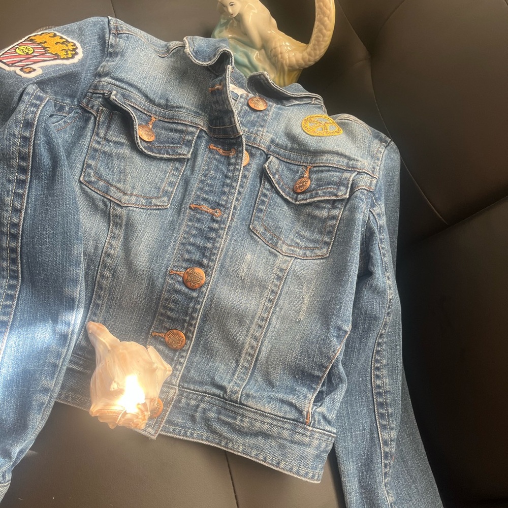 Return to School Cool in this Retro Jean Jacket. Justice size 12. Pre owned.